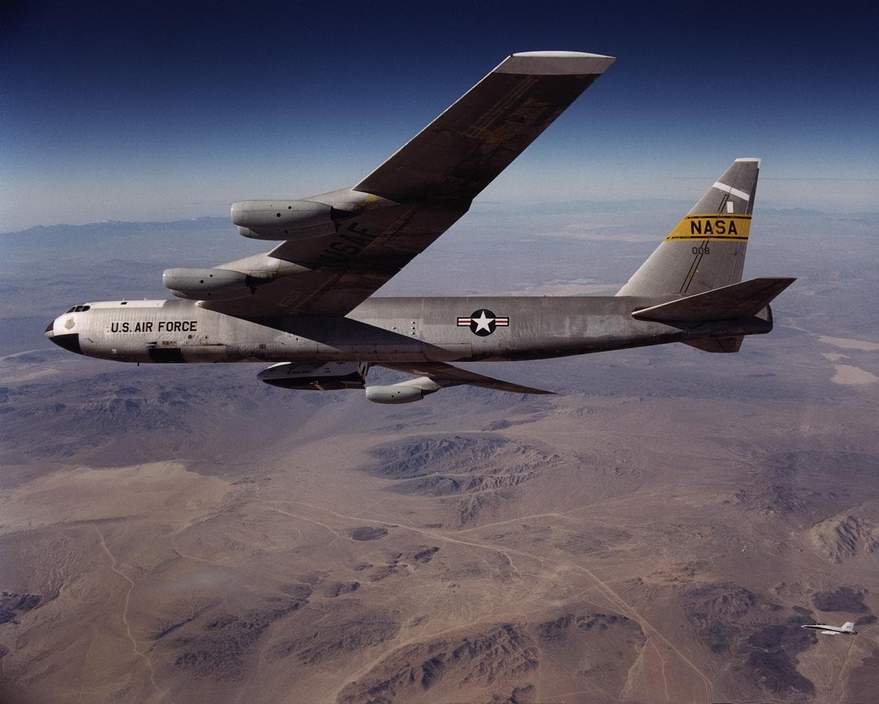 X-38 vehicle #131R during pre-launch with B-52 008 mothership and F-18 chase aircraft