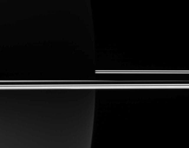 Rings Against a Dark Planet