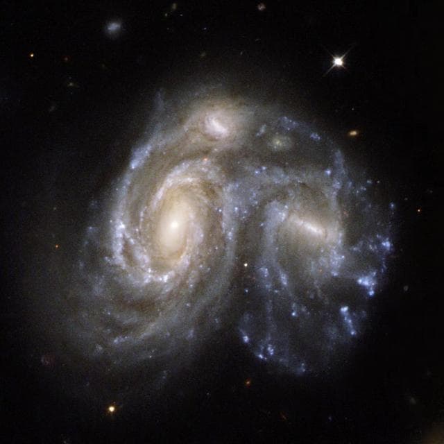 Collision Between Two Spiral Galaxies