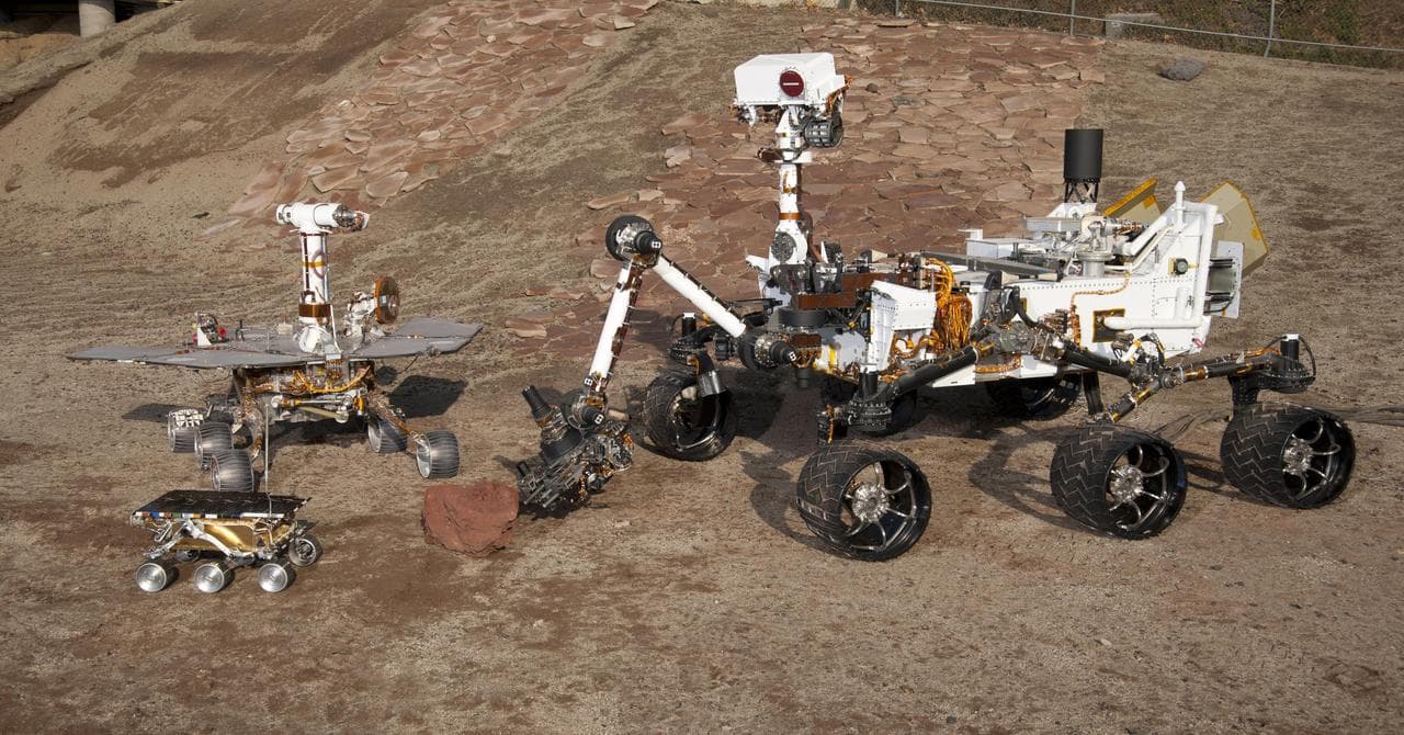 Three Generations of Rovers in Mars Yard
