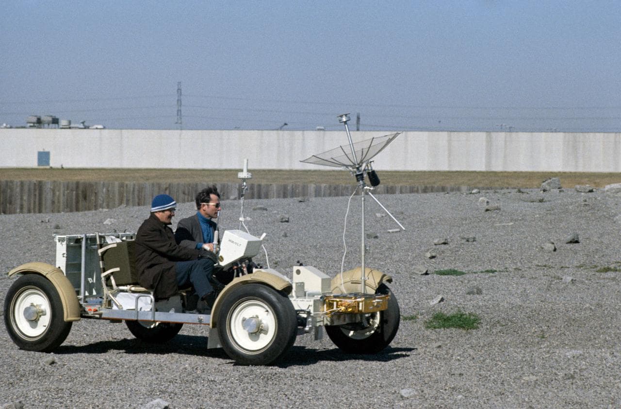 Astronaut John Young drives in One-G Lunar Roving Vehicle during simulation