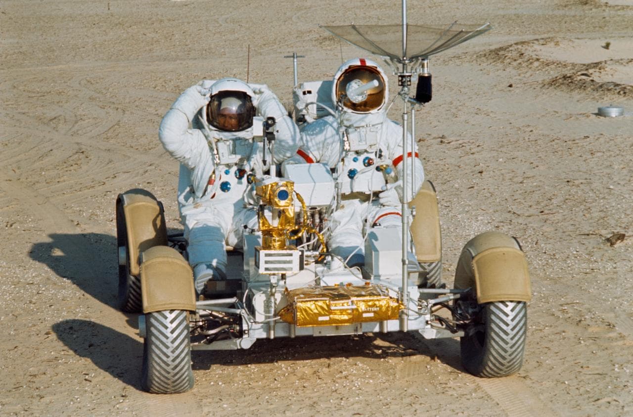 Astronauts Scott and Irwin shown on Lunar Roving Vehicle at KSC