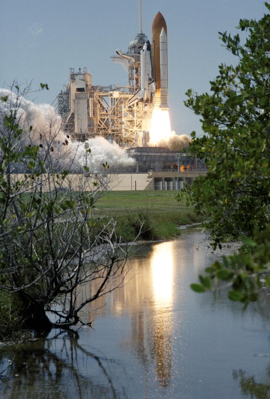 View of the launch of the Space Shuttle Endeavour at KSC to start the STS-100 mission