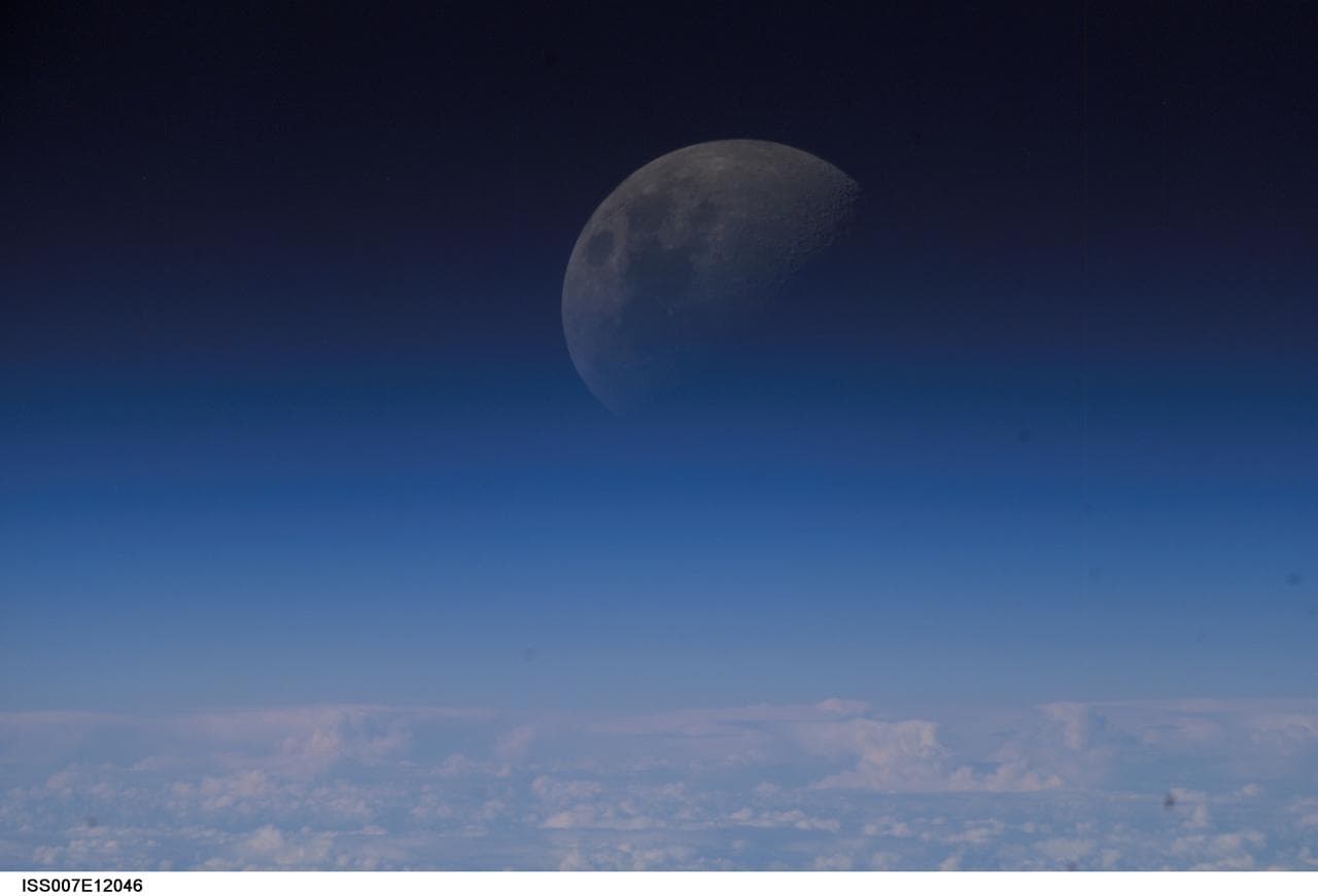 Moon over an Earth limb taken by the Expedition Seven crew