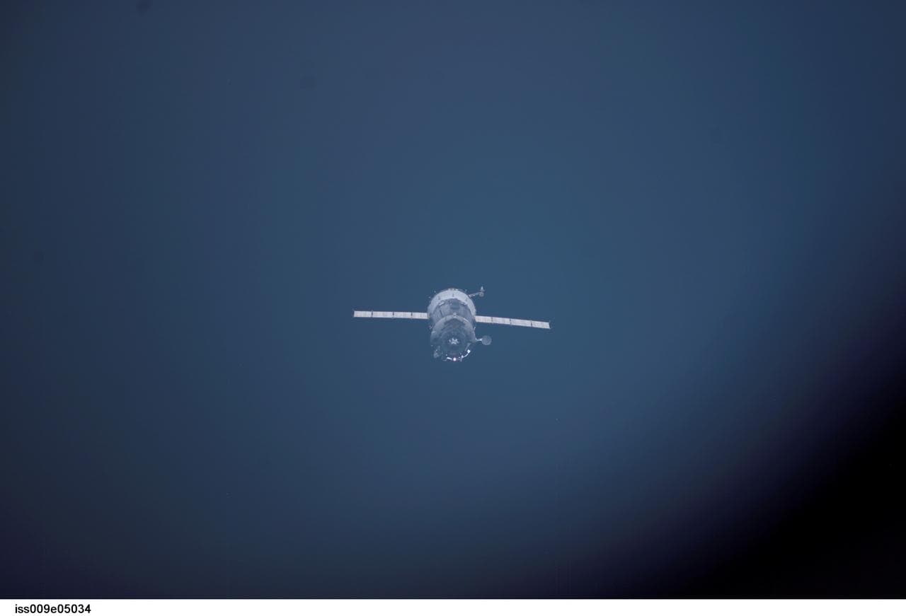 Soyuz TMA-3 separates from the Space Station after undocking, taking the Expedition 8 crew back to Earth