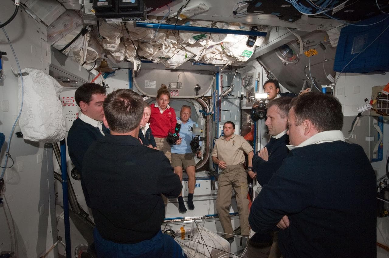 View of Expedition 28 Crew Members greeting the STS-135 Crew