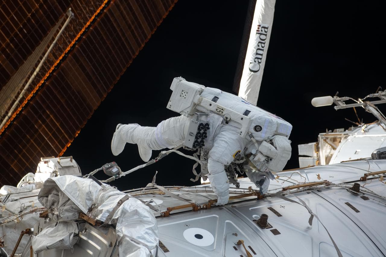 Astronaut Butch Wilmore works outside the International Space Station