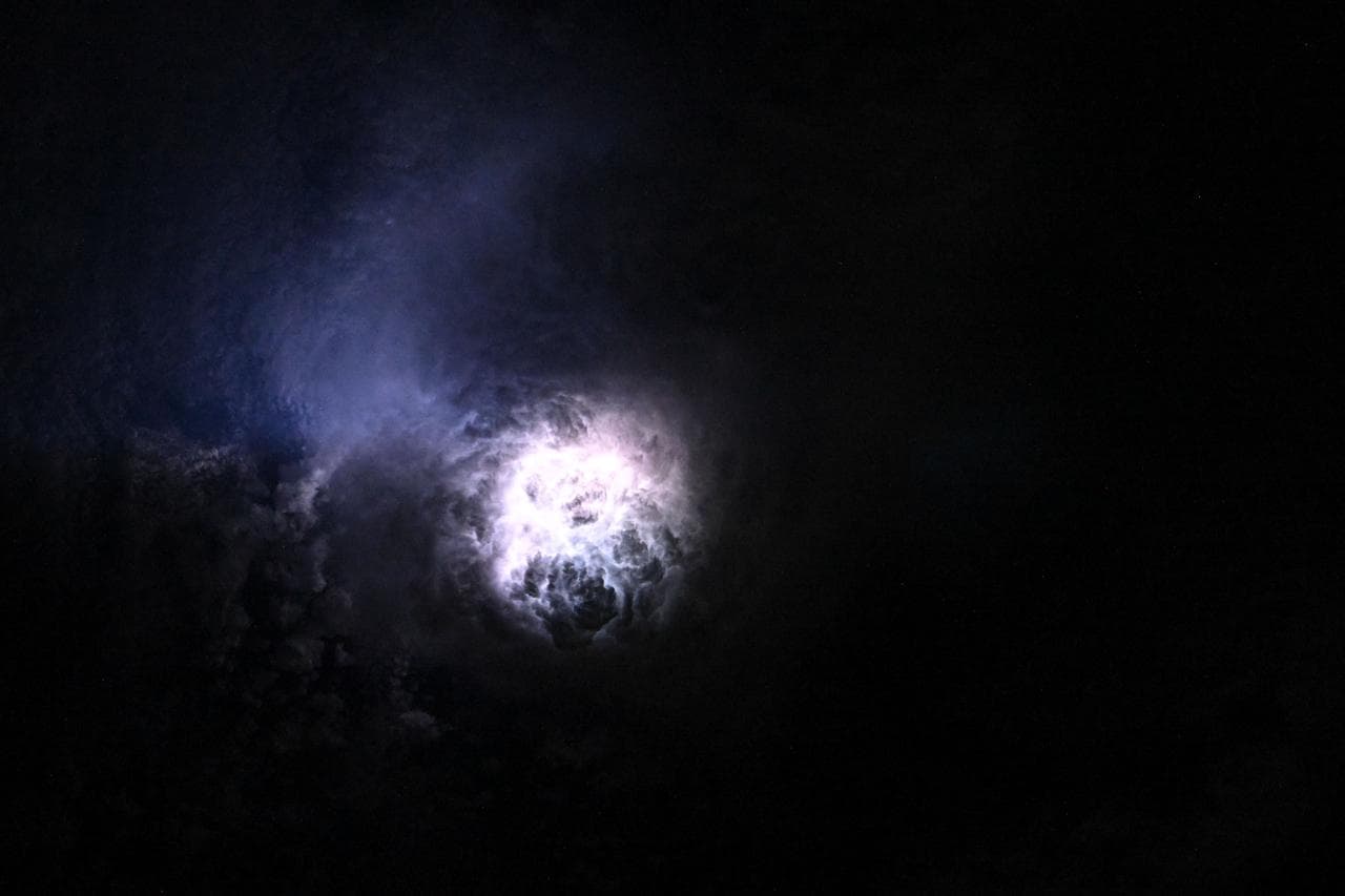 Lightning illuminates the clouds during a storm off the coast of North Carolina