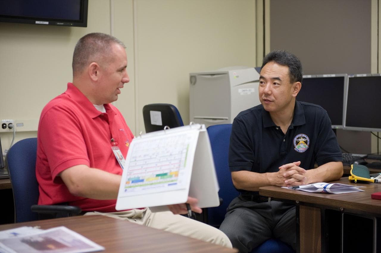 Expedition 28 JAXA astronaut Satoshi Furukawa and Astronaut Mike Fossum  
