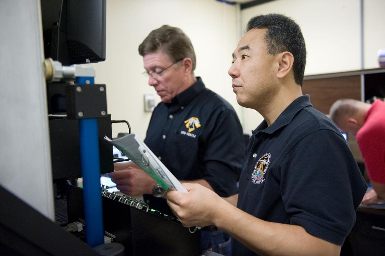 Expedition 28 JAXA astronaut Satoshi Furukawa and Astronaut Mike Fossum  