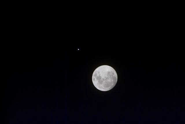 Full moon as seen from STS-103 orbiter Discovery.