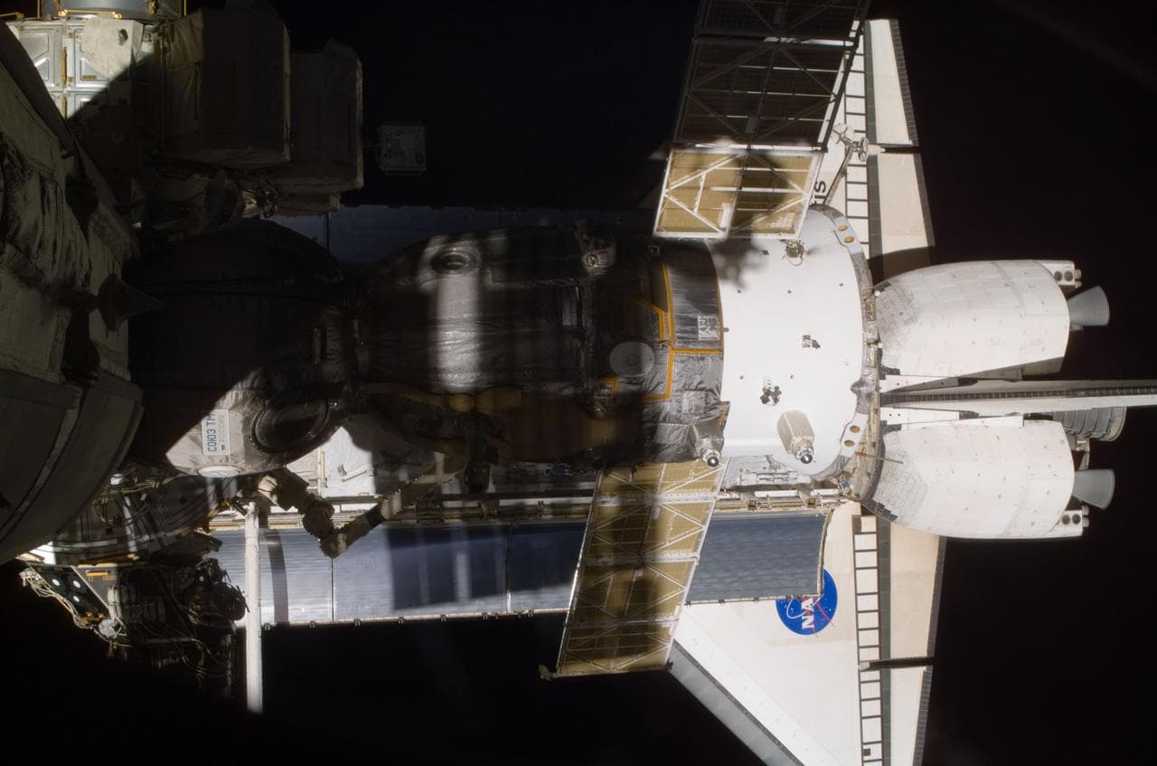View of the Soyuz and Atlantis' payload bay taken during STS-110's visit to the ISS