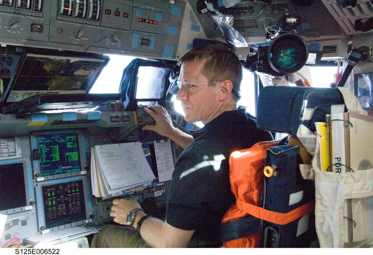   Johnson in the Shuttle Atlantis Flight Deck