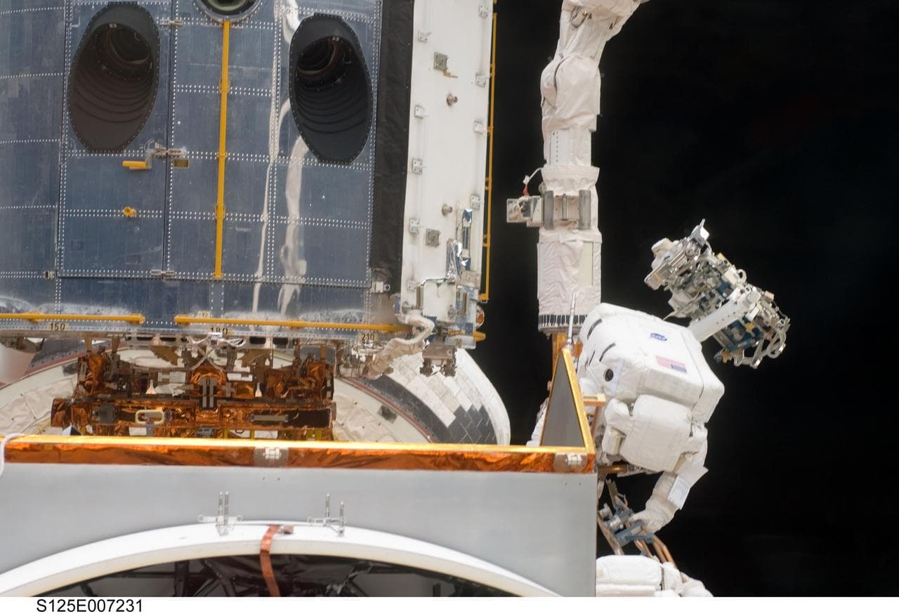 STS-125 MS5 Feustel during EVA1