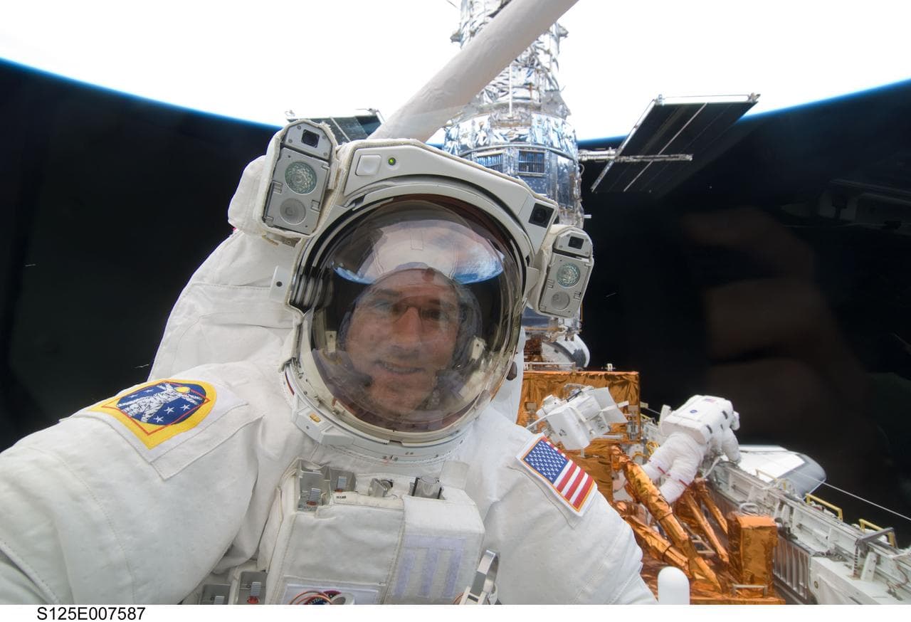STS-125 MS1 Good posing for a photo during EVA2