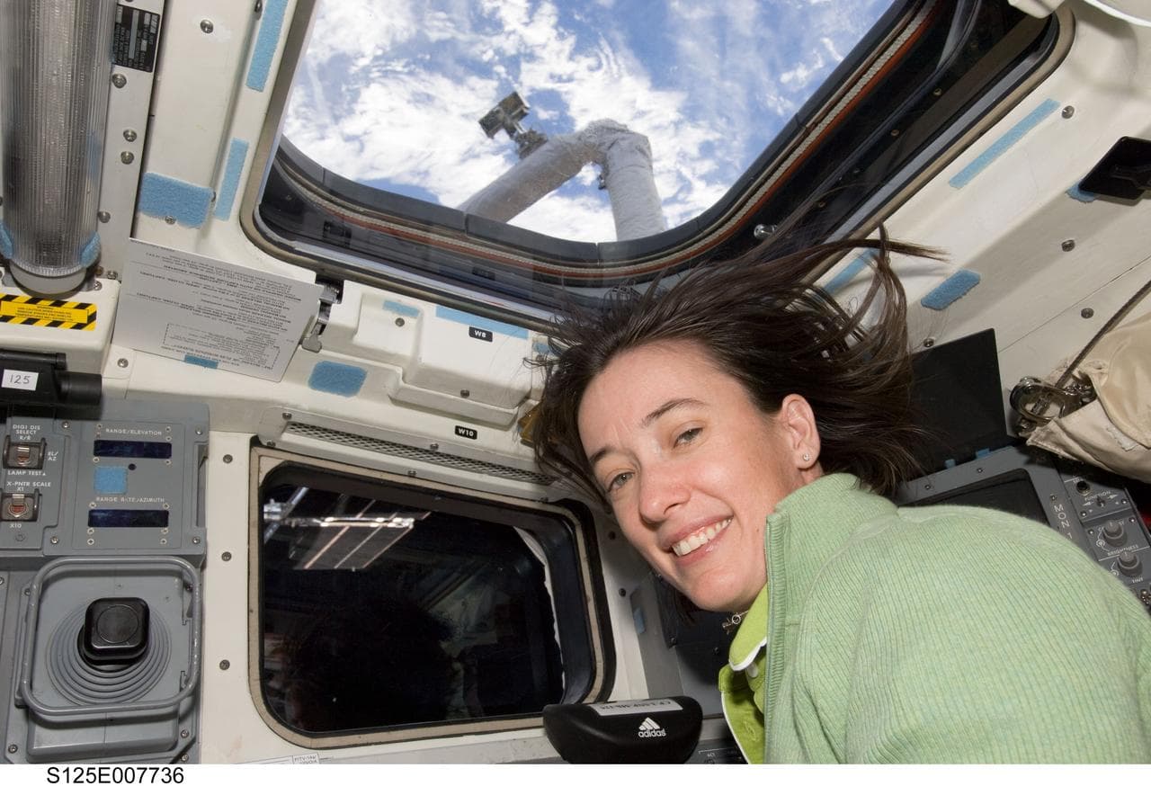 STS-125 MS2 McArthur poses for a photo on the FD during Flight Day 5