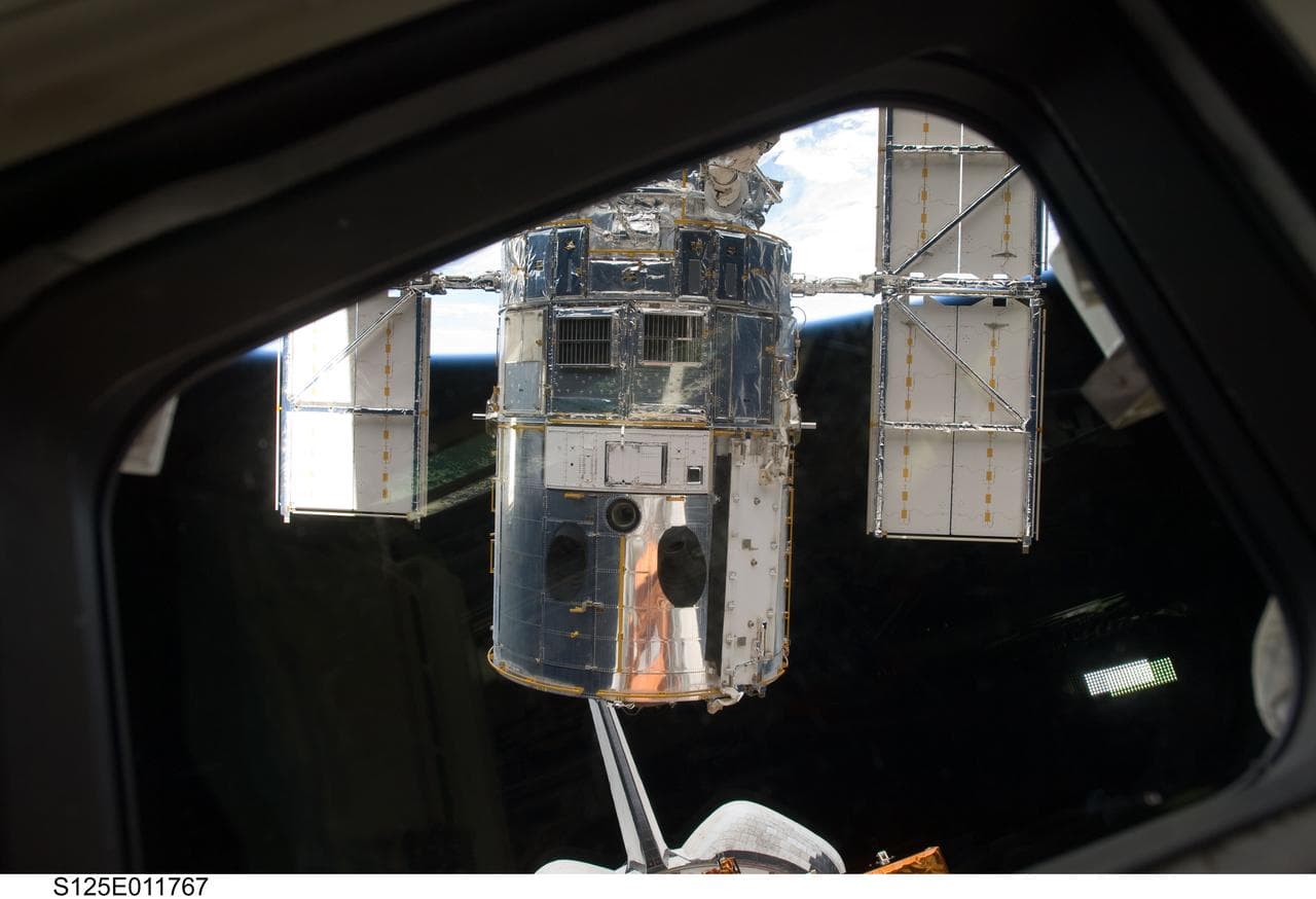 View of HST during its release from the Shuttle Atlantis