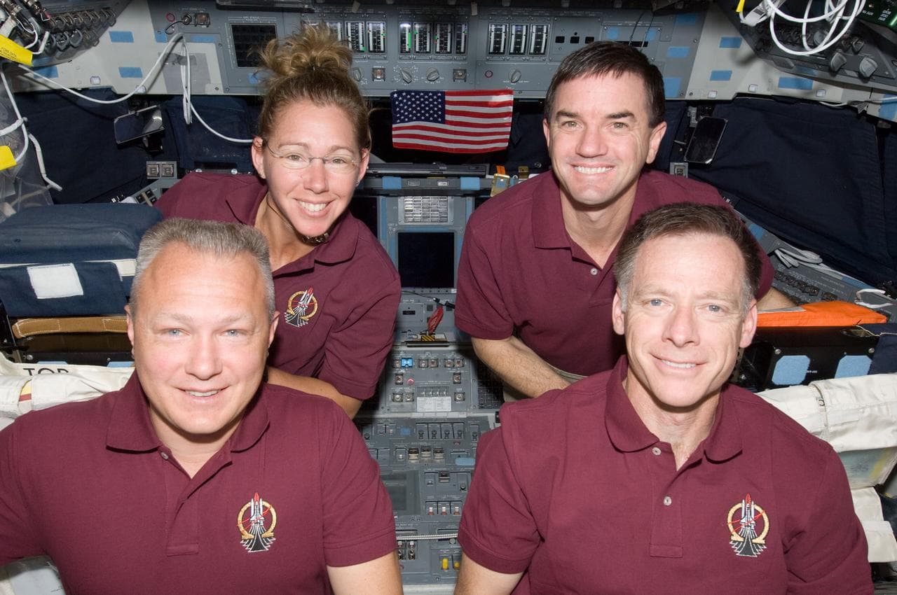 In-Flight Portrait of the STS-135 Crew on the Atlantis Flight Deck