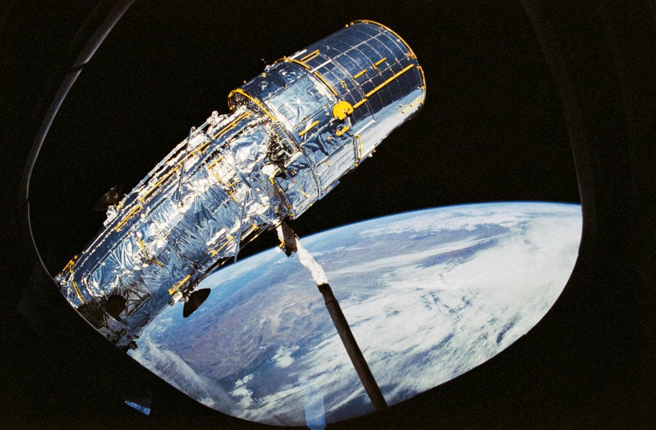 Hubble Space Telescope (HST) solar array (SA) panel deployment during STS-31