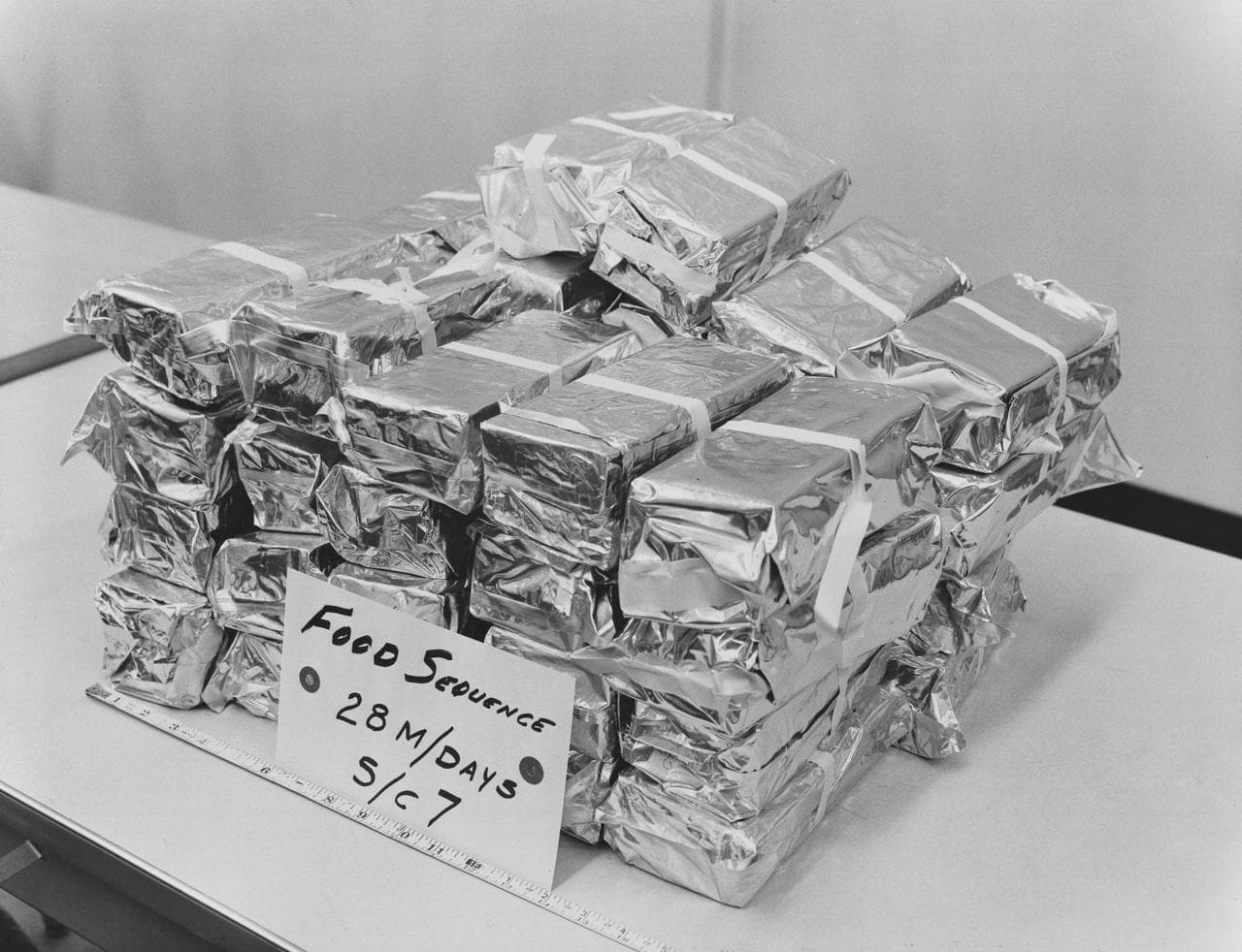 View of food packets for the Gemini 7 space flight
