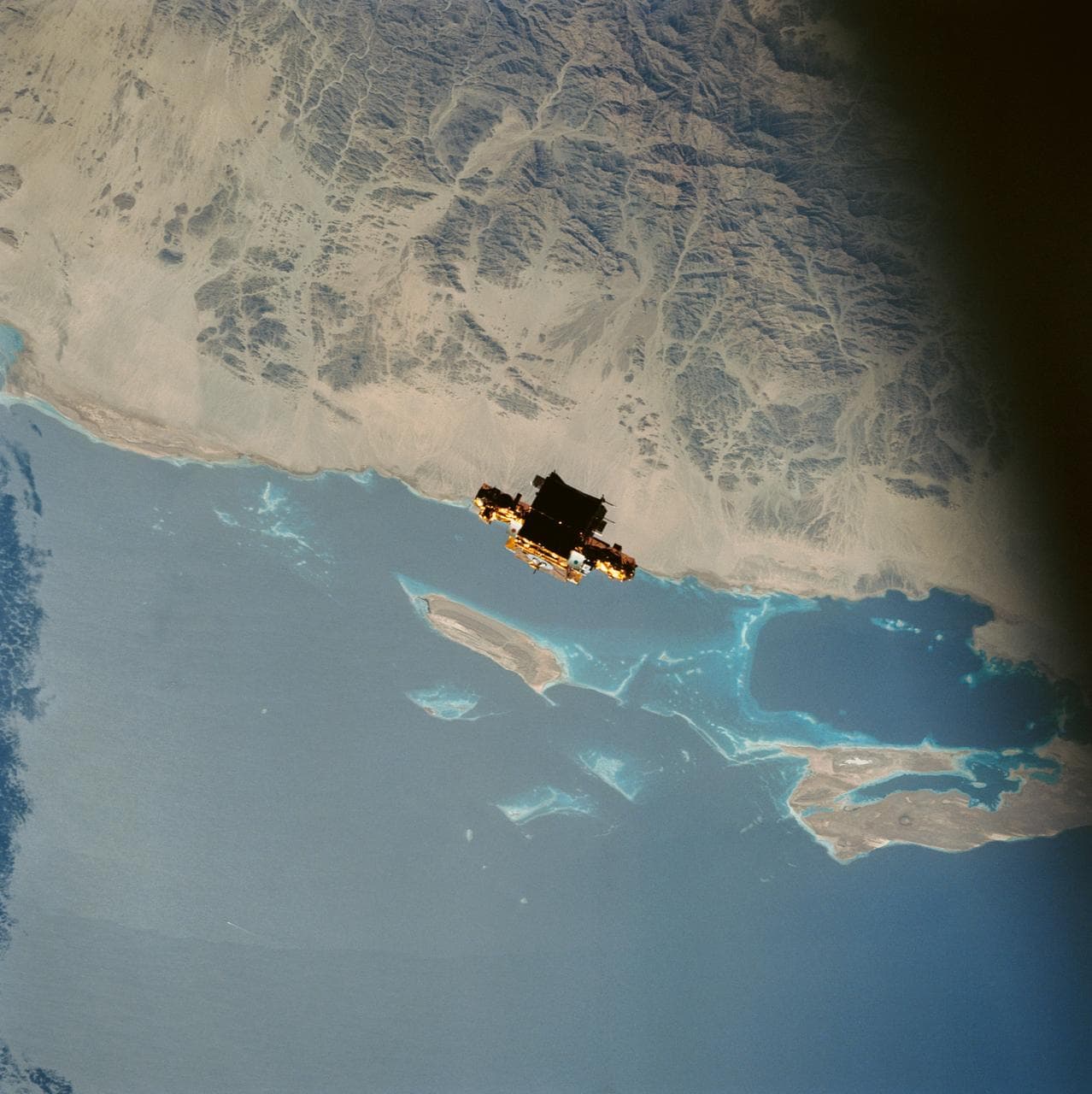 STS-56 freeflying SPARTAN-201 backdropped over the Red Sea coast of Sudan