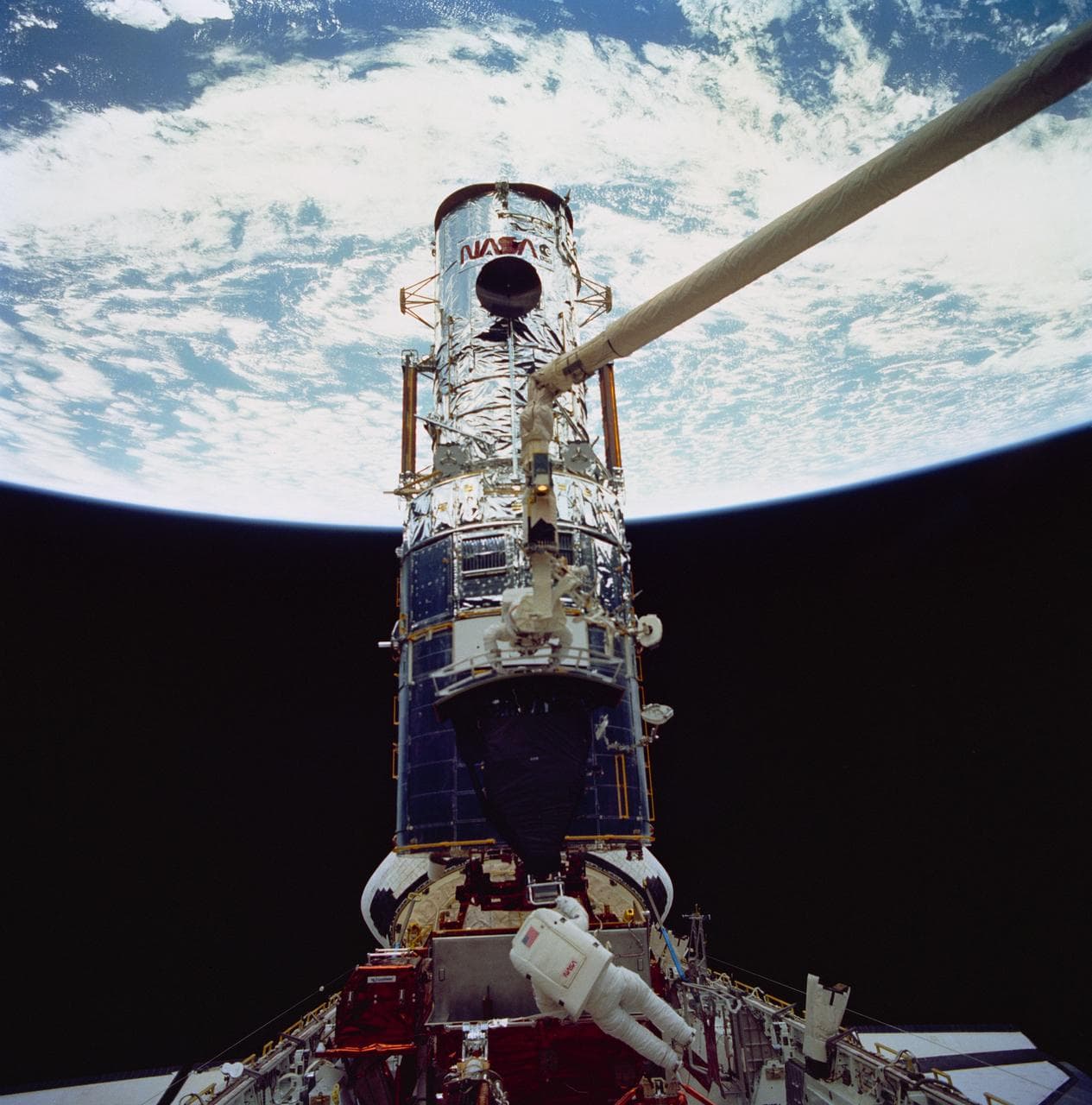 Astronaut Jeffrey Hoffman with WF/PC during third STS-61 EVA