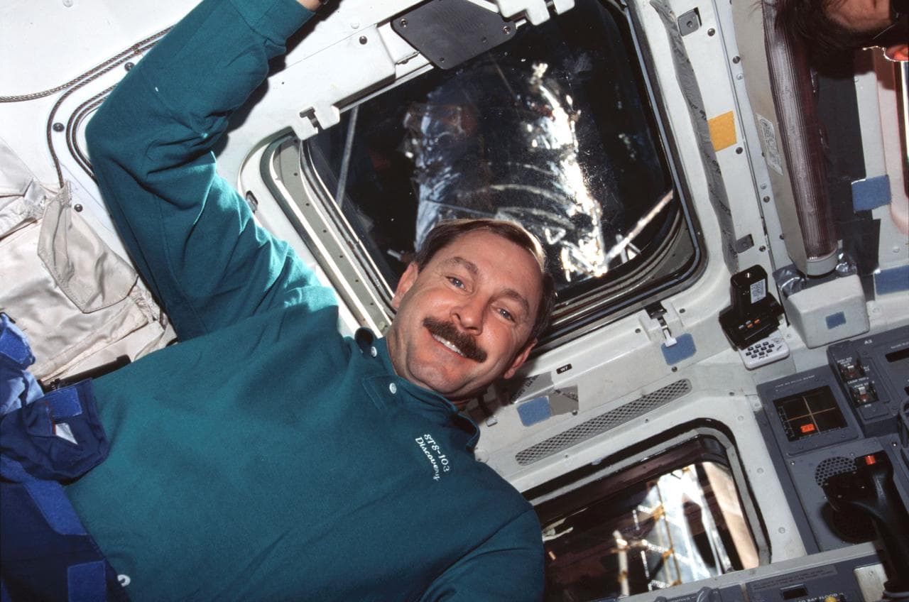 Various views of the STS-103 crew on the aft flight deck